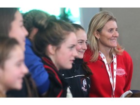 Olympic gold medalist Hayley Wickenheiser poses with young women at her annual Canadian Tire Wickenheiser Female World Hockey Festival opening day Friday November 18, 2016 at Windsport. They had just gone through a workout session with Olympic bobsled gold medalist Kallie Humphries. (Ted Rhodes/Postmedia Calgary ) ORG XMIT: POS1611181647512008