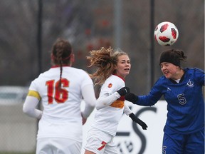 University of Calgary Dinos player Maya Ida (#7) defends against the University of Montreal Carabins during action of the U Sports women's soccer championships in November 2018.