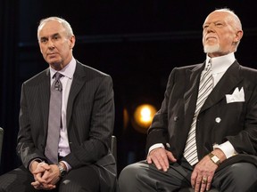 Ron MacLean (left) sits beside Don Cherry as Rogers TV unveils their team for the station's NHL coverage in Toronto on Monday, March 10, 2014. THE CANADIAN PRESS/Chris Young