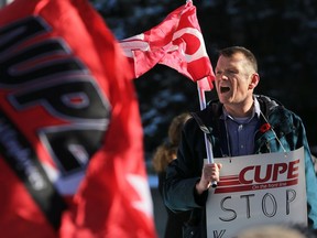 Rory Gill, president of CUPE Alberta, rallies several hundred people representing a variety of unions as they protested the provincial budget outside Calgary City Hall on Wednesday November 6, 2019.