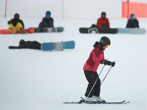 Skiers and snowboarders hit the snow at Winsport in Calgary on  Friday, November 15, 2019. The ski and the snowboard hill at Canada Olympic Park opened on Friday for the winter season.