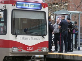 Calgary Police and Transit officers seen at the scene of an alleged assault on a CTrain in downtown Calgary on Friday, November 15, 2019. One male was taken to hospital.