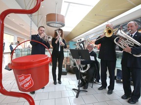 The Glenmore Temple Band performs at Southcentre Mall to help launch the Salvation Army Christmas kettle campaign in Calgary on Saturday, November 16, 2019. This is the second year that Skyrie has volunteered and when the campaign is at its peak, 70 different locations in and around Calgary will have kettles. Donations are accepted for cash, debit and credit card. Jim Wells/Postmedia