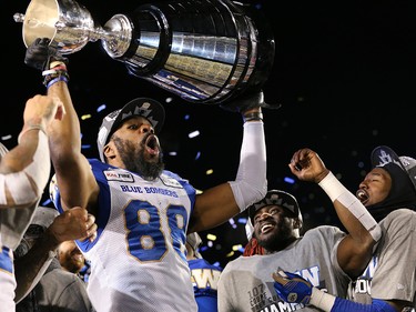 The Winnipeg Blue Bombers’ Rasheed Bailey raises the Grey Cup with teammates as they celebrate defeating the Hamilton Tiger-Cats 33-12 to win the 107th Grey Cup in Calgary Sunday, November 24, 2019.
Gavin Young/Postmedia