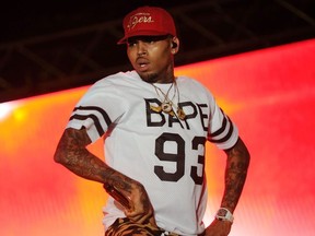 This file photo taken on June 26, 2015 shows singer Chris Brown performing during a free concert in Champ de Mars, downtown Port-au-Prince, Haiti.