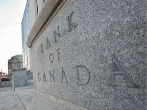 (FILES) In this file photo The Bank of Canada building is seen in Ottawa on April 12, 2011. - Canada's central bank on October 30, 2019 maintained its key lending rate at 1.75 percent, taking a cautious stance ahead of an expected global downturn despite a few bright spots in the Canadian economy. The Bank of Canada cited positive economic indicators such as strong jobs growth and housing activity picking up, but also warned "that the resilience of Canada's economy will be increasingly tested as trade conflicts and uncertainty persist." (Photo by GEOFF ROBINS / AFP)