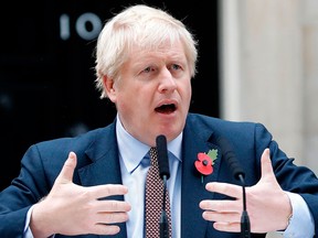 Britain's Prime Minister Boris Johnson speaks outside number 10 Downing Street in central London on Nov. 6, 2019.