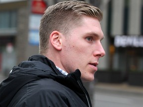 Former Mount Royal hockey captain Matthew Brown leaves the Calgary Courts Centre. Brown is accused of attacking an MRU professor in her Springbank Hill home last year. Tuesday, November 12, 2019. Brendan Miller/Postmedia