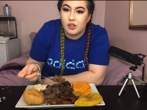 Charna Rowley is seen in a YouTube video eating Caribbean food. (Charnation/YouTube)