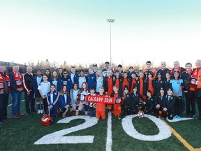 Dignitaries, football and soccer players and representatives from Blizzard Soccer Club, Calgary Minor Soccer Association and Calgary Amateur Football association gather at Shouldice Field in northwest Calgary on Wednesday, November 13, 2019. Plans for Shouldice Indoor Athletic Facility were announced as a Grey Cup Legacy Project with the City of Calgary as a partner. The inflatabe facility will be available from October to May maximizing the use of the field year round. Jim Wells/Postmedia