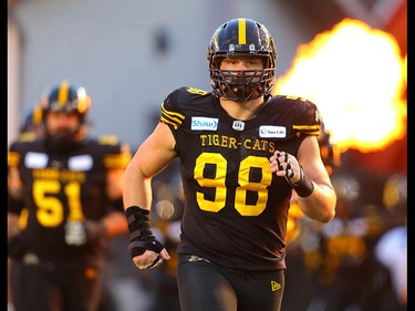 Hamilton Tiger-Cats Dylan Wynn runs onto the field during the 107th Grey Cup CFL championship football game in Calgary on Sunday, November 24, 2019. Al Charest/Postmedia