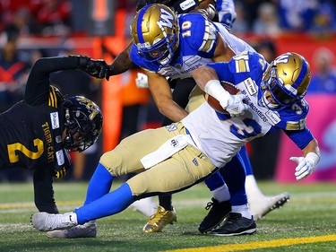 Andrew Harris of the Winnipeg Blue Bombers goes in for a touchdown during the 107th Grey Cup CFL championship football game in Calgary on Sunday, November 24, 2019. Al Charest/Postmedia