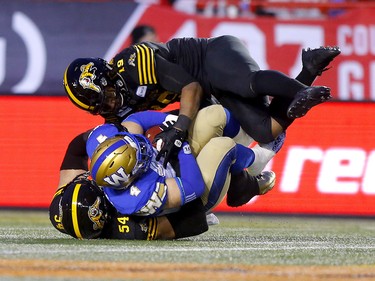 Winnipeg Blue Bombers, Adam Bighill with a fumble recovery against the  Hamilton Tiger-Cats, in first half action at McMahon stadium during the 107th Grey Cup in Calgary on Sunday, November 24, 2019. Darren Makowichuk/Postmedia