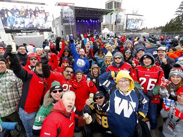 Thousands of fans ham it up during the Tailgate party at McMahon stadium during the 107th Grey Cup in Calgary on Sunday, November 24, 2019. Darren Makowichuk/Postmedia