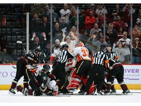 Nov 16, 2019; Glendale, AZ, USA; Arizona Coyotes and Calgary Flames players fight during the second period at Gila River Arena. Mandatory Credit: Joe Camporeale-USA TODAY Sports ORG XMIT: USATSI-405294