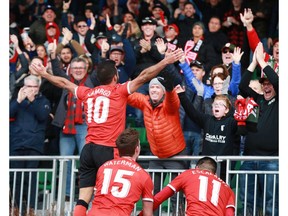 Cavalry FC Sergio Camargo celebrates with fans after a second half goal during CPL soccer action between FC Edmonton and Cavalry FC at ATCO Field at Spruce Meadows in Calgary on Saturday, October 19, 2019. Cavalry won 3-1 and took the fall season. Jim Wells/Postmedia