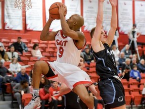 SAIT's Kaleel Faiz spins to the net during Friday's game.