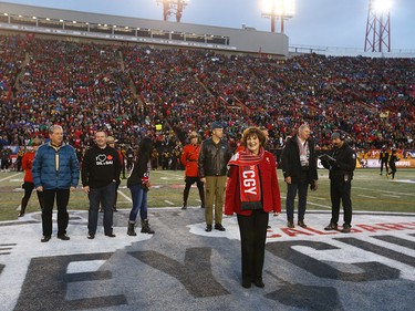 Alberta Lieutenant Governor Lois Mitchell takes part the coin toss before the 107th Grey Cup CFL Championship football game in Calgary at McMahon Stadium, Sunday, November 24, 2019. Jim Wells/Postmedia