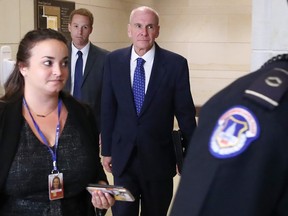 Michael McKinley, centre, former senior adviser to Secretary of State Mike Pompeo, walks away from a closed door hearing at the U.S. Capitol Oct. 16, 2019 in Washington, D.C. (Mark Wilson/Getty Images)