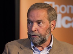 Federal NDP leader Thomas Mulcair speaks with the media at Federal NDP caucus at the Fairmont Hotel MacDonald in Edmonton, Alta., on Wednesday, Sept. 10, 2014. Ian Kucerak/Edmonton Sun/ QMI Agency