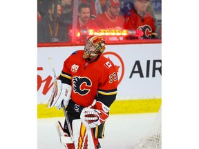 Calgary Flames goalie David Rittich reacts after giving up a goal  Vladislav Kamenev of the Colorado Avalanche during NHL hockey in Calgary on Tuesday November 19, 2019. Al Charest / Postmedia