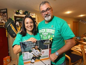 Toby and Bernadine Boulet in their Lethbridge home, surrounded by hockey memorabilia. Their son Logan, a victim of the Humboldt Broncos bus crash, donated six of his organs for transplant.