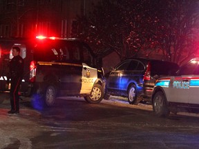 Calgary police investigate a possible shooting in the 1100 block of 14th Avenue S.W. Friday, Nov. 29, 2019.