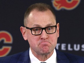 An emotional Calgary Flames GM Brad Treliving speaks to media in Calgary at the Saddledome on Friday, Nov. 29, 2019. The Flames officially announced Bill Peters will no longer coach the team.