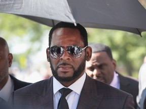 R. Kelly leaves the Leighton Criminal Courts Building following a hearing on June 26, 2019 in Chicago.