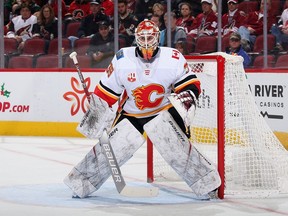 Goaltender Cam Talbot #39 of the Calgary Flames in action during the first period of the NHL game against the Arizona Coyotes at Gila River Arena on December 10, 2019 in Glendale, Arizona.