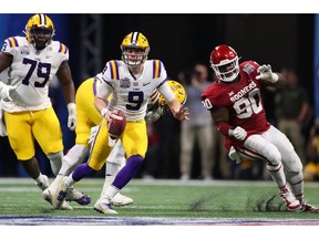 ATLANTA, GEORGIA - DECEMBER 28: Quarterback Joe Burrow #9 of the LSU Tigers delivers scrambles during the game against the Oklahoma Sooners in the Chick-fil-A Peach Bowl at Mercedes-Benz Stadium on December 28, 2019 in Atlanta, Georgia.