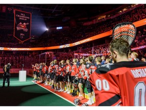 Roughnecks championship banner from 2018-2019 NLL season is raised in Scotiabank Saddledome on Saturday, December 21, 2019. Azin Ghaffari/Postmedia