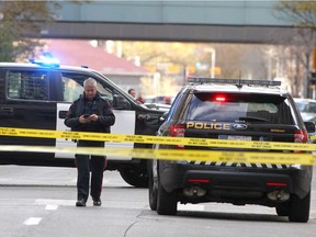 The scene downtown at 5th Ave. and 6th St. as police investigate an officer-involved shooting in the core Saturday, October 19, 2019.