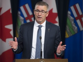 Minister of Finance Travis Toews introduces Bill 22 in the media room at the Alberta Legislature on November 18 2019.