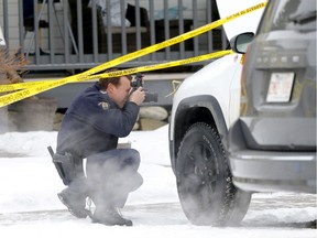 RCMP and ASIRT investigate a fatal shooting by a RCMP member in Cochrane on Saturday, December 7, 2019. Darren Makowichuk/Postmedia