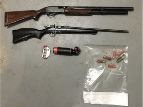 Cochrane RCMP has charged three adults with numerous weapons offences.