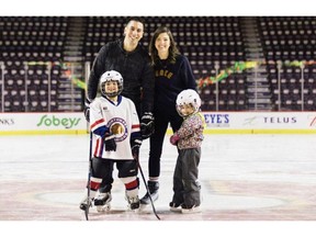 Calgary Flames assistant general manager Chris Snow has been diagnosed with ALS, also known as Lou Gehrig's disease. Here, Chris is joined by his wife Kelsie and his children. Photo courtesy of the Calgary Flames.