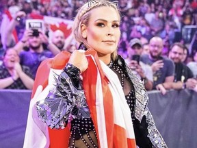 Walking down the aisle for my Raw Women's Championship match with Becky Lynch at SummerSlam. It was a dream come true. (WWE Photo)