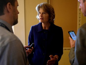 U.S. Senator Lisa Murkowski (R-AK) speaks with reporters off the Senate floor in Washington, D.C., May 23, 2019. File Photo