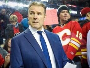 Calgary Flames interim head coach Geoff Ward during warm-up before facing the Ottawa Senators during NHL hockey in Calgary on Saturday November 30, 2019. Al Charest / Postmedia