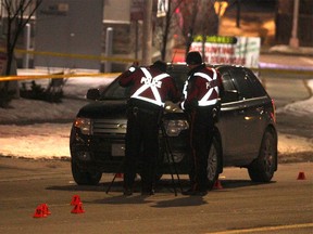 Police are seen investigating after receiving a call around 3:30 p.m. that two pedestrians were struck but a vehicle while crossing Westwards Dr. NE near 47th St. One child and one adult were rushed to hospital. Thursday, December 19, 2019. Brendan Miller/Postmedia