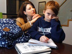 Wendy Hennel and her daughter Zoe will be directly impacted by teacher cuts this fall, losing one of her favourite teachers at Christmas, after he has worked tirelessly to create an individualized plan that has helped her develop academically in spite of her dyslexia in Calgary on Wednesday, November 27, 2019. Darren Makowichuk/Postmedia