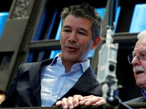 Former Uber Technologies Inc. CEO and co-founder Travis Kalanick stands on a balcony above the trading floor of the New York Stock Exchange during the company's IPO in New York, May 10, 2019.