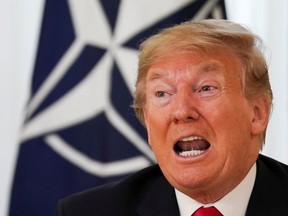 U.S. President Donald Trump speaks during a meeting with NATO Secretary General Jens Stoltenberg (not pictured), ahead of the NATO summit in Watford, in London, Britain, December 3, 2019.