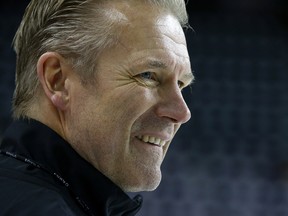 Flames head coach Geoff Ward mixed things up with a soccer ball at practice on Monday.