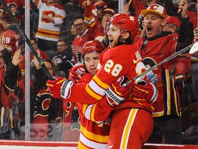 Elias Lindholm celebrates after scoring the game-winning goal against the Edmonton Oilers on Jan. 11, 2020 at the Saddledome.