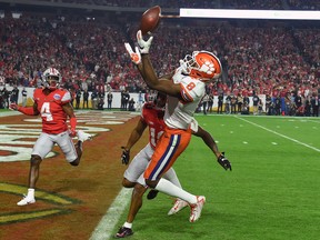 Clemson Tigers’ Justyn Ross attempts to catch a pass against the Ohio State Buckeyes last weekend. Ross had 153 receiving yards in last year’s championship game.  Getty Images