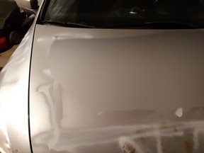 Graffiti painted on a car in Douglas Glen last night is being investigated as a hate-motivated crime, and police are asking the public for any information that could help find the person responsible.