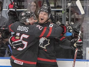 Canada's Ty Dellandrea, right, celebrates with teammate Aidan Dudas after scoring the fourth goal against Finland during first period semifinal action at the World Junior Hockey Championships on Saturday, Jan. 4, 2020 in Ostrava, Czech Republic. (THE CANADIAN PRESS/Ryan Remiorz)