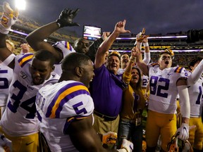 LSU Tigers head coach Ed Orgeron and his players will heck of a party if they win the national championship tonight.  USA TODAY